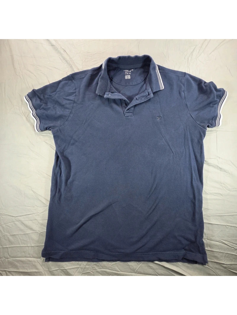 American Eagle Outfitters navy blue slim-fit polo shirt